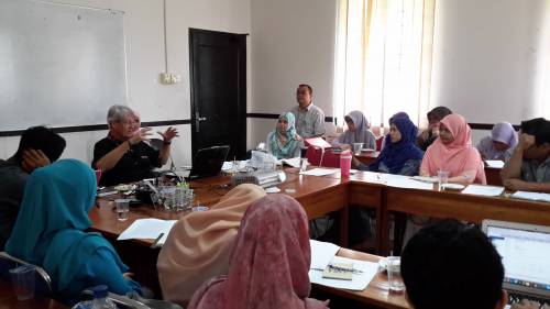 Bernard Adeney-Risakotta (left), mission co-worker and professor of religion, ethics and social sciences with the Indonesian Consortium for Religious Studies, teaches a class in Indonesia. Photo by Farsijana Adeney-Risakotta.