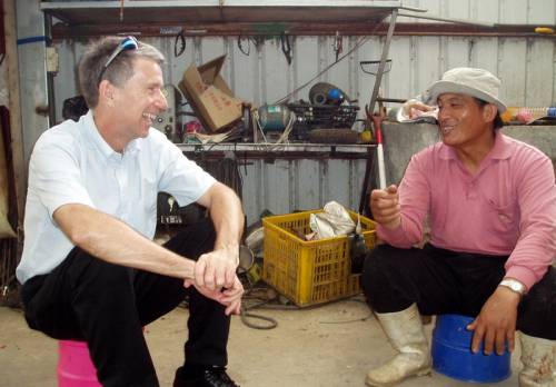 John McCall talks with a Bunun tribal elder in Taiwan. Photographer unknown.