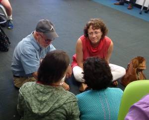 Presbyterians gather in small groups during the Big Tent workshop on Educate a Child. —Rick Jones