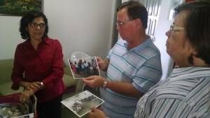 Nilza showing Gordon and Dorothy activities of the school
