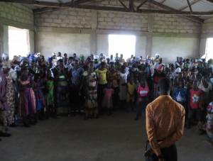 A young adult member of a Presbyterian congregation in northern Ghana leading a weekday prayer for the congregation. Young adults in their 30s and 40s eagerly lead many ministries and small groups in local congregations.