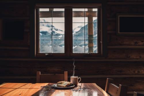  Sliced Bread With Hot Coffee On Wood Table In Wooden Lodge
