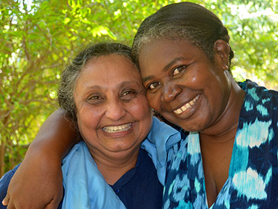 Aruna Ratnavibhushana and her new friend, Rosana Thelusma (Photo courtesy of Cindy Corell)
