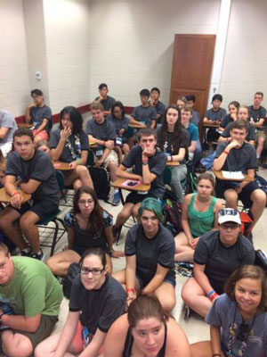 Teenagers attending the recent Youth Triennium crowded into a classroom to discuss environmental and racial justice issues. (Photo by Jennifer Evans)