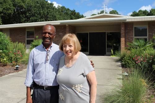 The Rev. Dr. Donnie R Woods, executive presbyter for Charleston Atlantic Presbytery and Sue Mathews, elder at Harborview Presbyterian Church in Charleston, continue to work to help families recover from October 2015 flooding. (Photo by Rick Jones)
