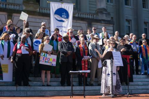 The Rev. Dr. Peggy Hinds, interim director of the Kentucky Council of Churches, speaks during ‘Higher Ground Moral Day of Action’ on the steps of the Kentucky State Capitol. (Photo by Gregg Brekke)