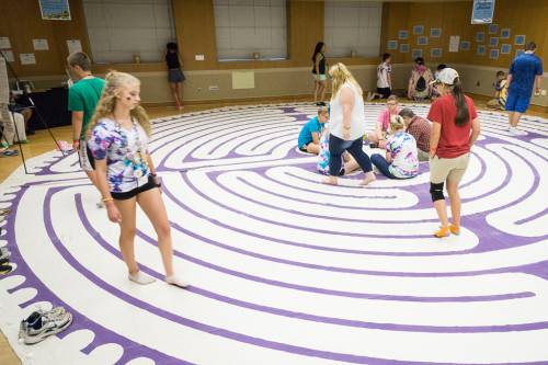 Young adults walk the labyrinth for prayer, discernment, and experiencing the presence of God. (Photo by Gregg Brekke)