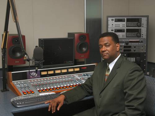 Warren B. Cooper in the radio studio. (Photo by Vincent Pogue)