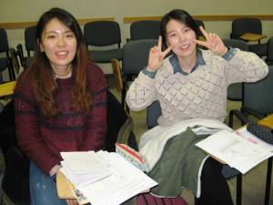 Two exchange students from Korea, Hyseu Kim and Danbee Choi, are taking economics with Eric