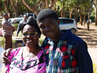Judith Mwanza and son, Jacob, on visiting day at the Chassa Boarding School in Sinda