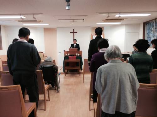 The Rev. Nobuo Morisato leading worship at the Japan Mission Osaka Church