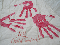 Red hand imprints, text" No Child Soldiers!!