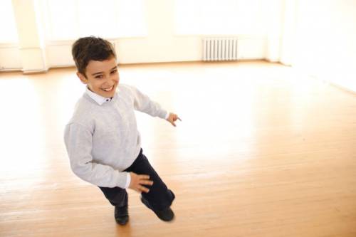 young boy dancing
