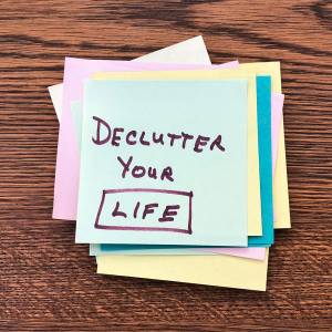 Post-it note with the words: Declutter Your Life