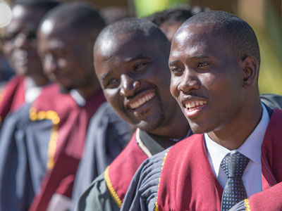 Happy JMU graduates Sam Ruzivo and Charles Ngoma lining up for the ceremony (Photo by Johanneke Kroesbergen)