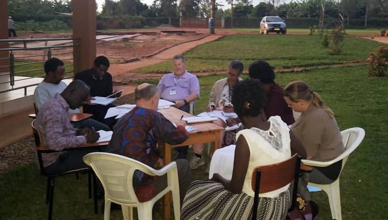 Suzan and Kuat’s group prepares lessons to teach in their practicum in Rwanda.