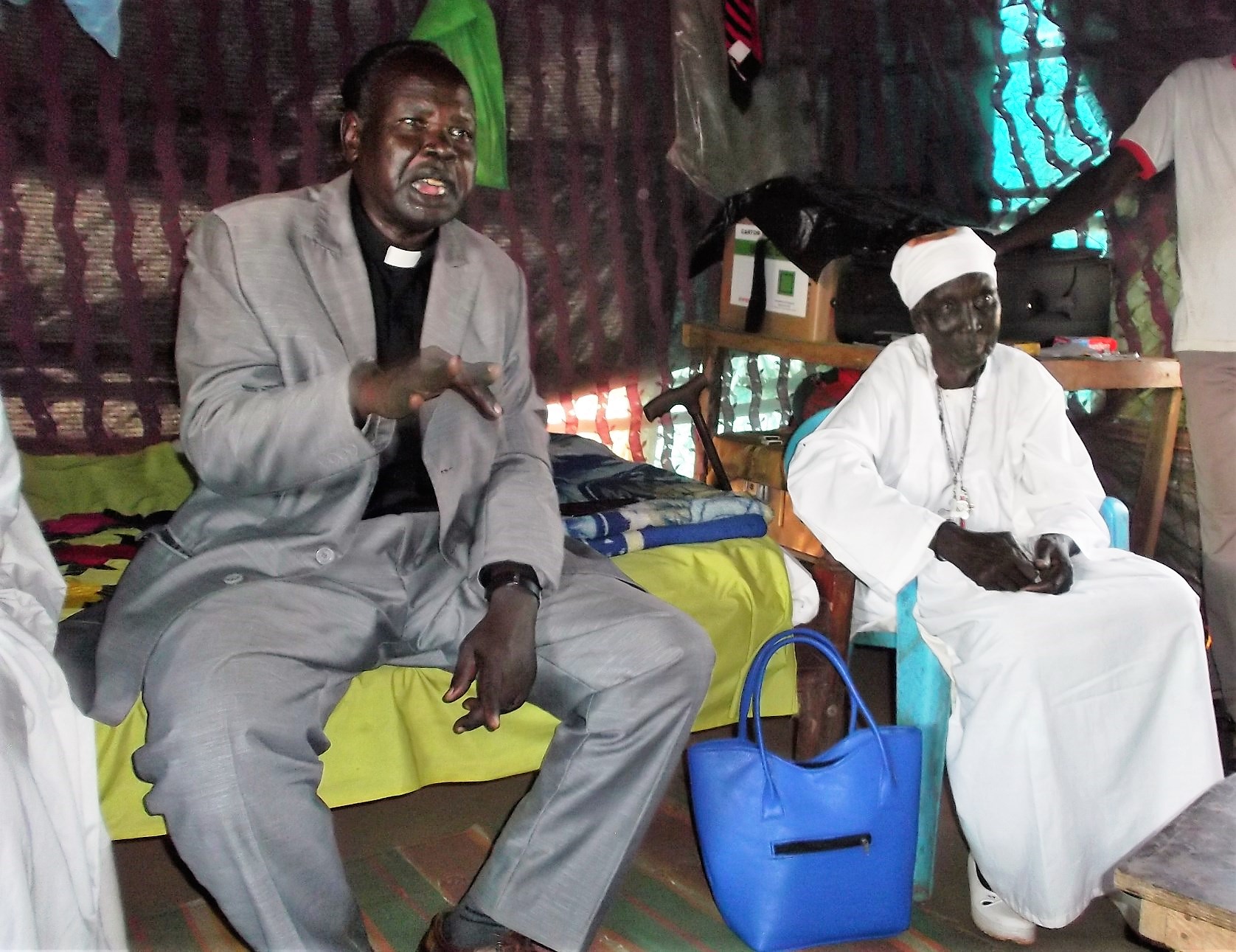 Pastor Peter, in his tent in the refugee camp, talks about the challenges of being displaced.