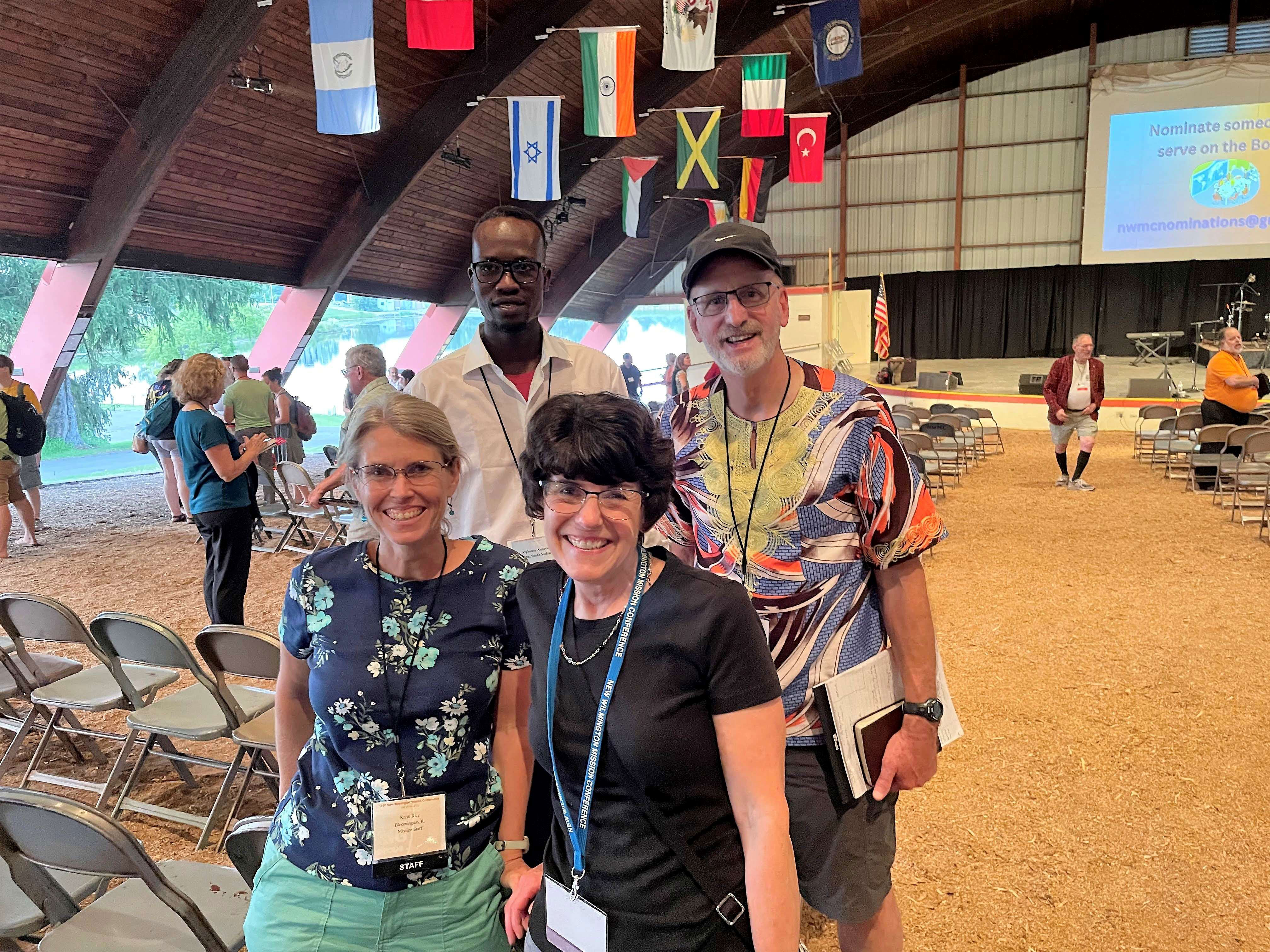 Alphonse from South Sudan and Kristi along with Denise and Jim, two members of the South Sudan mission network, attending the New Wilmington Mission Conference.