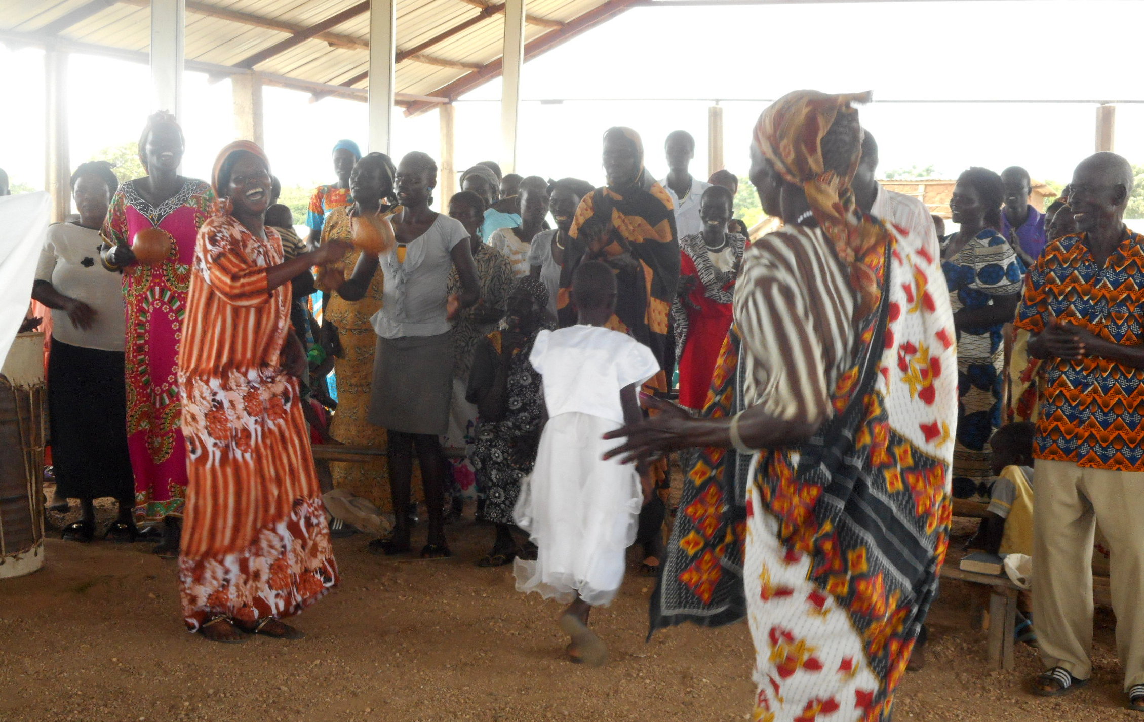 Members of the Jebel Jeshua congregation worship God and give thanks for a new roof, a gift given by the Presbyterian Church(USA) with support from the Booth Foundation.