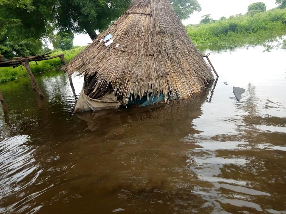 A house collapses in flood waters in the northern region of Bentiu.
