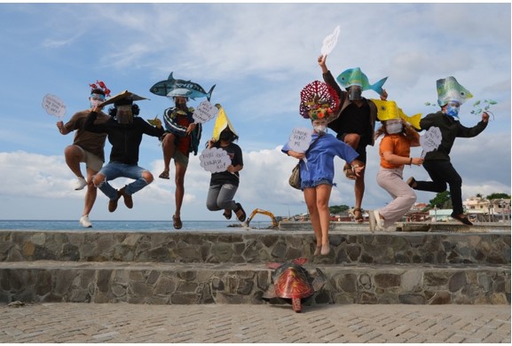 Members of YATTA wearing headpieces of marine species. (Photo credits: Hersley Casero)