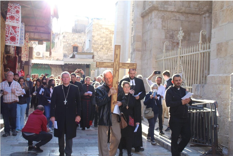 Good Friday morning in Jerusalem. Walking the Via Dolorosa. Photo Credit: Maddi Froiland, ELCJHL.