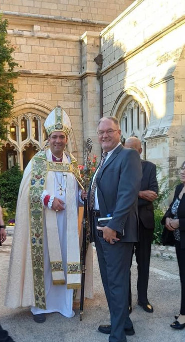Doug greets the new Archbishop of the Episcopal Diocese of Jerusalem following his service of consecration at St. George’s Cathedral, in Jerusalem.