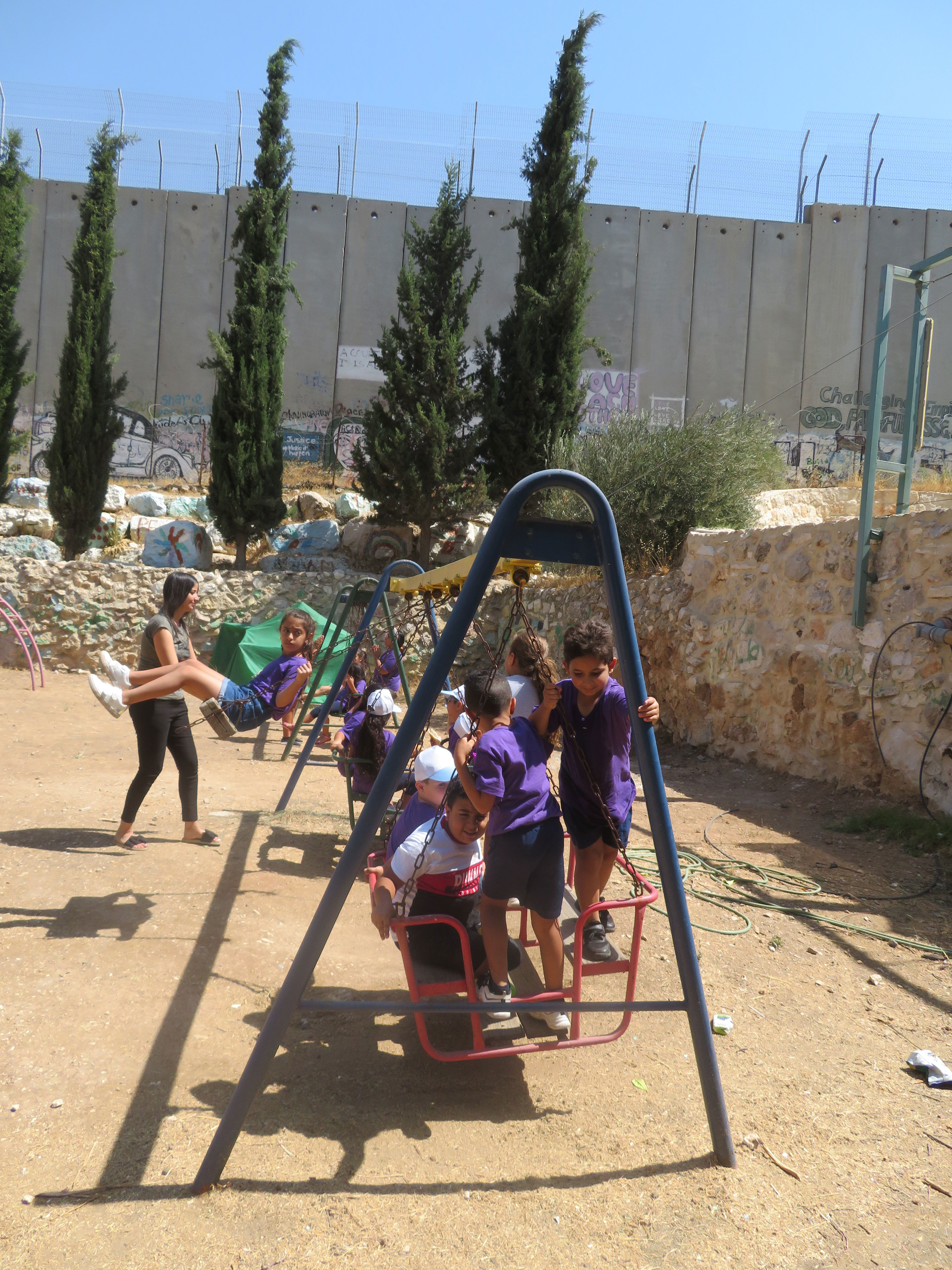 In the shadow of Israel’s Separation Barrier/Wall, a summer camp for Palestinian children at the Wi’am Palestinian Conflict Transformation Center