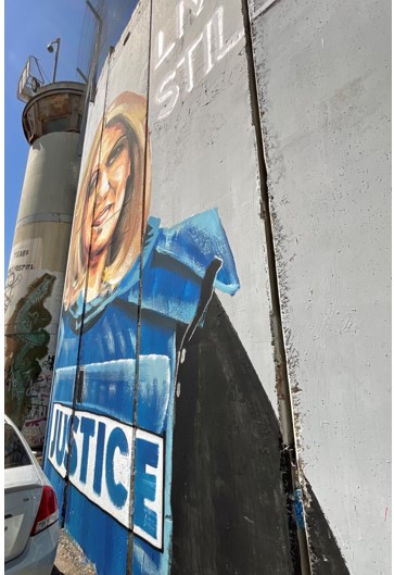The word “Justice” is displayed on Shireen’s press vest in this painting by Palestinian artist Taqi Spateen.