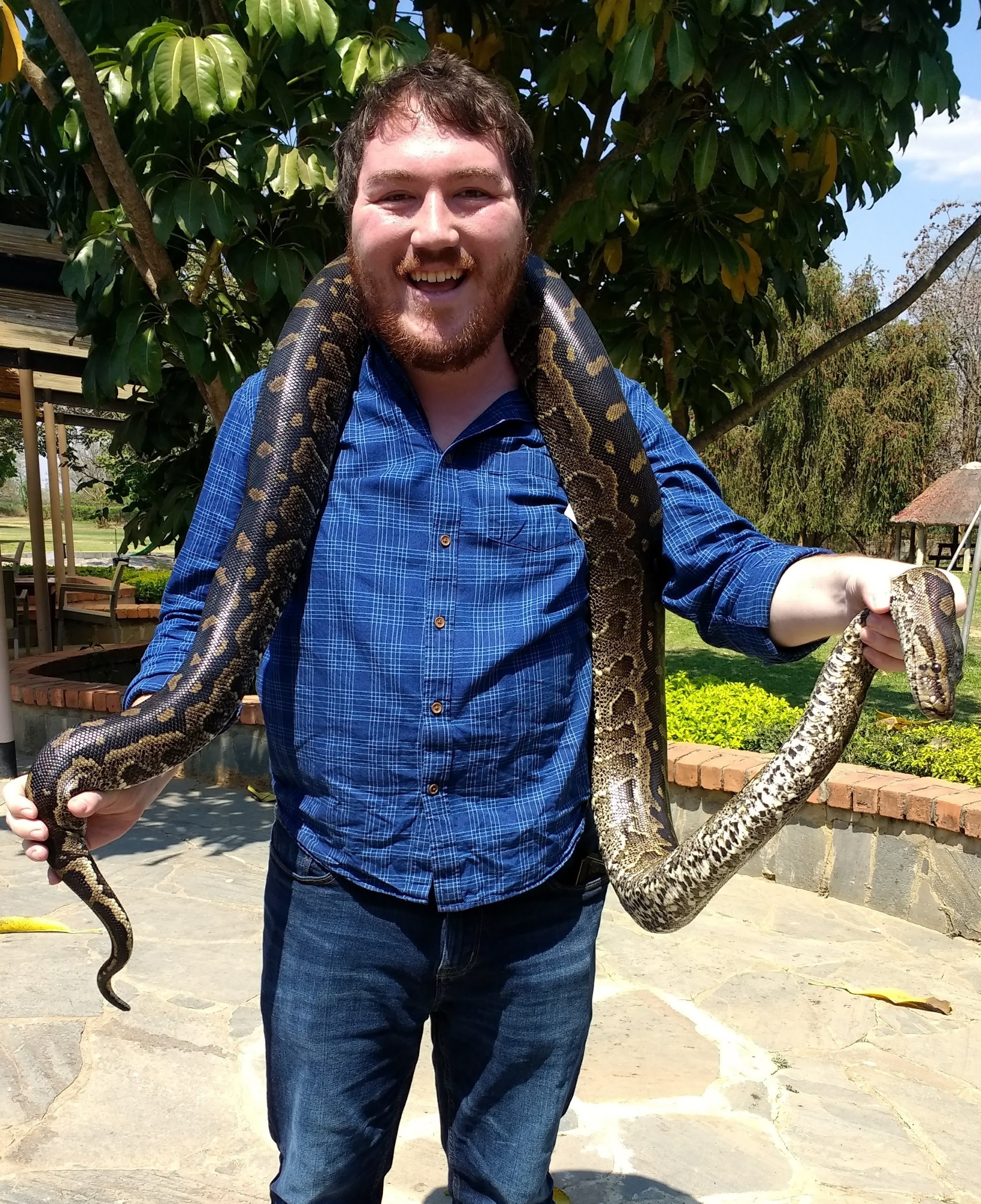 Miguel is one of our more adventurous YAVs. Here he is with a python around his neck. Teaching 5th grade will also be quite the adventure!
