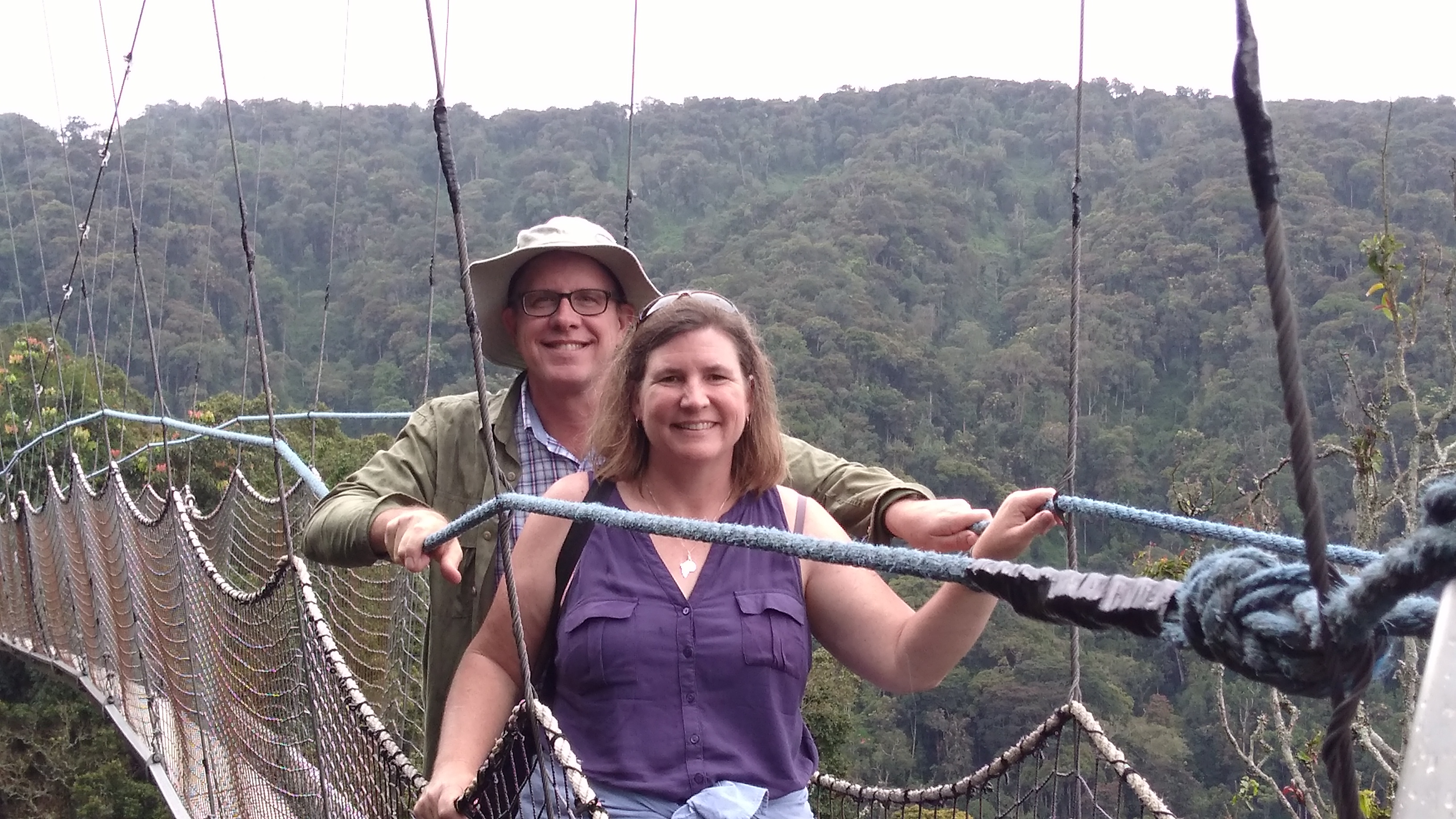 Enjoying Rwanda's lush Nyungwe Forest National Park, Dustin and Sherri brave the "canopy walk"