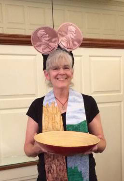 Hunger Action Advocate Denise Pillow dons ‘ears’ for the Two Cents-a-Meal/CentsAbility offering at presbytery meetings. (Photo by Dottie Hanshew)