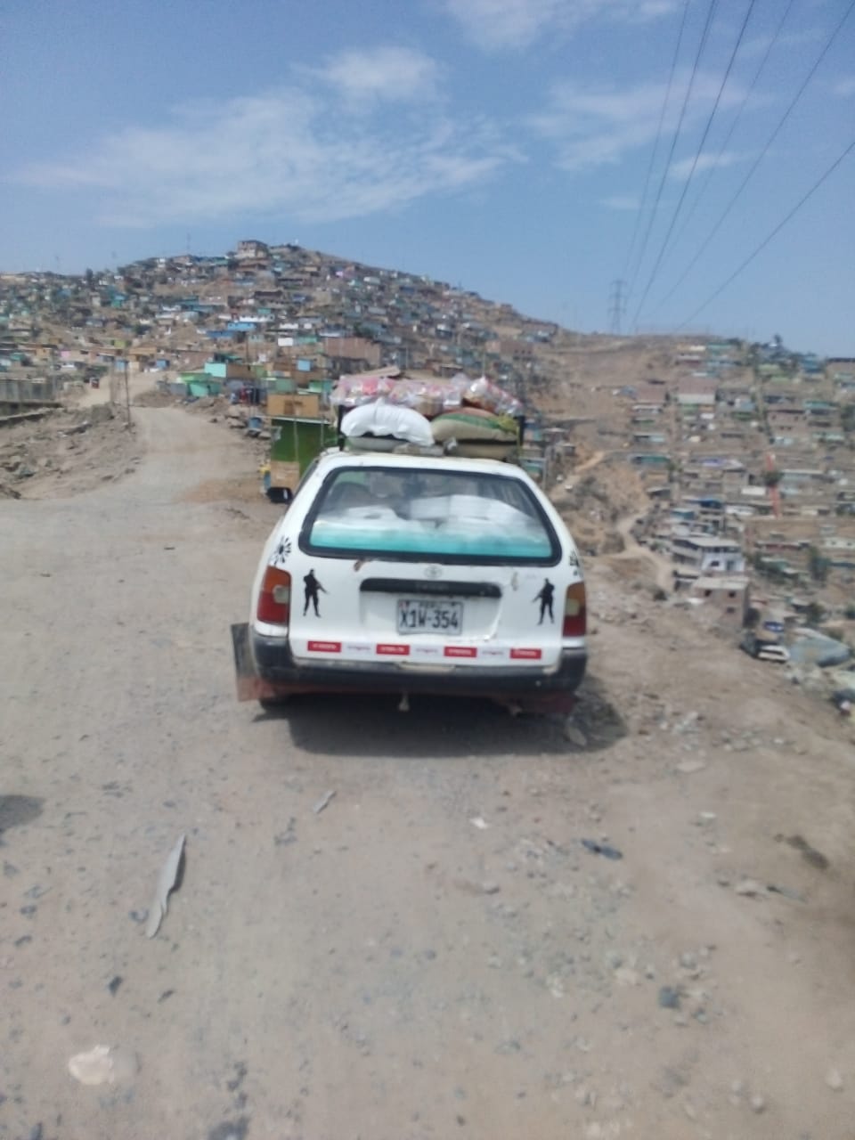 Support from Presbyterians helps get needed food and resources to families on the outskirts of Lima. Homes with no food or money hang white flags from their windows.