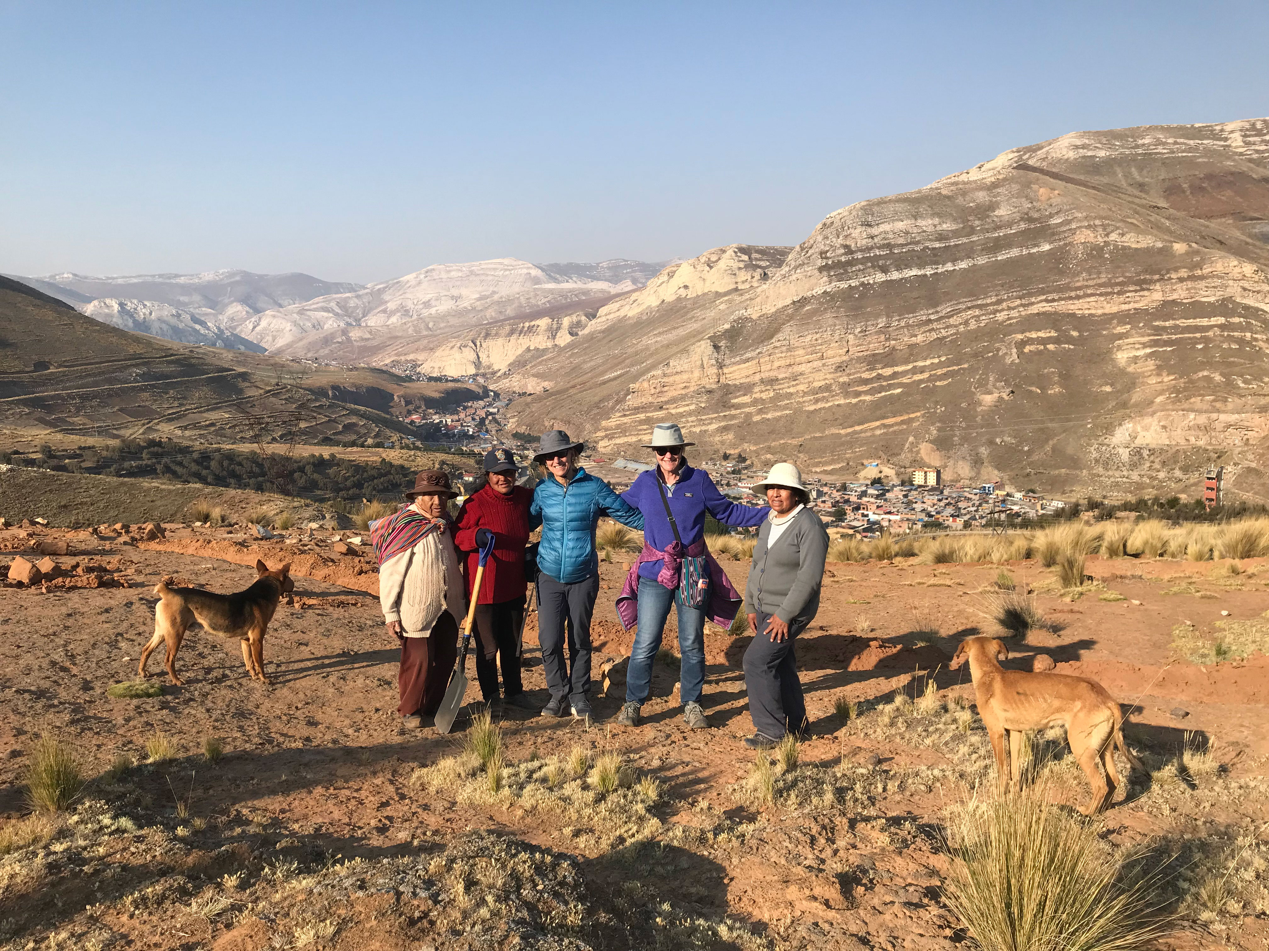 Presbyterians from Wisconsin gather with Yolanda Zurita (far right) and friends on the hills outside La Oroya where they work to recuperate the soil. (photo by Jed Koball, circa 2019)