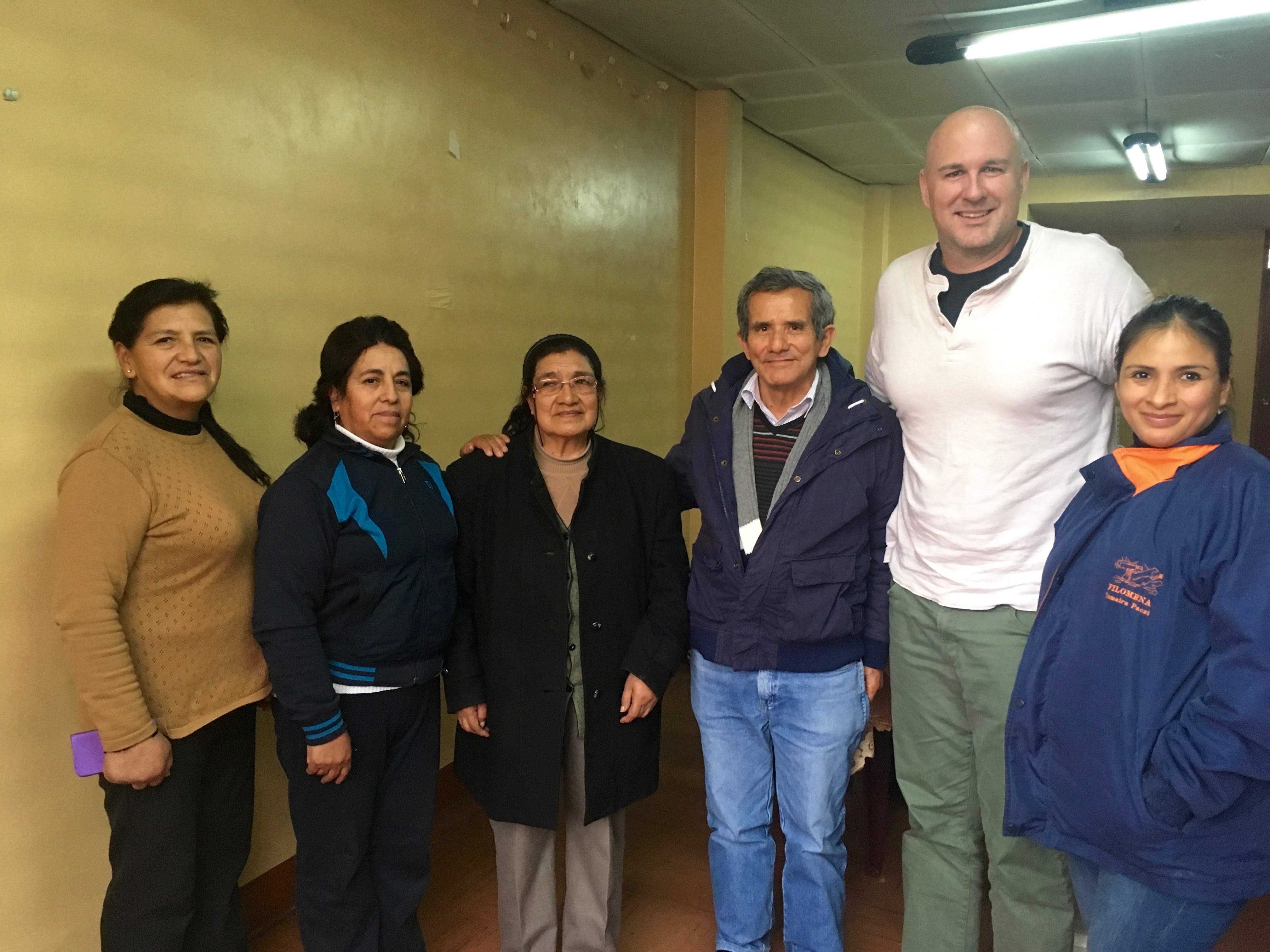 From left to right, partners gather in La Oroya to tell their story with friends and colleagues: Erlinda de la Torre, Yolanda Zurita, Esther Hinostroza, Conrado Olivera (director of the Joining Hands Network in Peru), Jed Koball and Sherley Echevarria (Esther´s daughter). (photo by Cindy Correl)