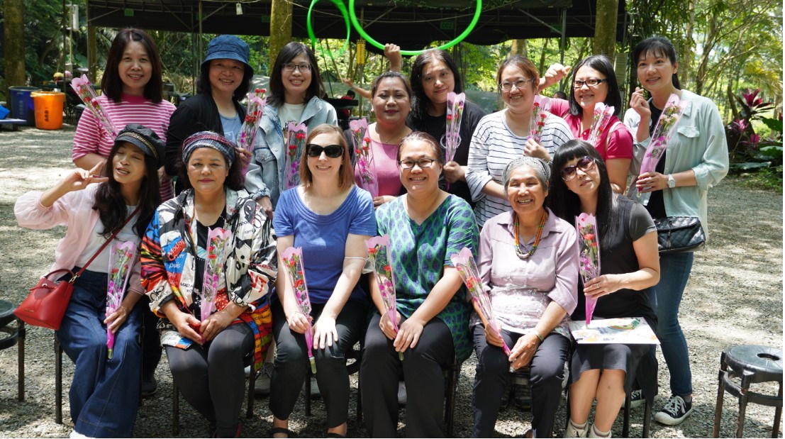 Emily Seitz with Rev. Puyang and other women during an outdoor Mother's Day event at Dongmen Presbyterian Church’s Indigenous Ministry Fellowship (provided by Rev. Puyang)