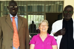 Sharon with two pastors who studied with her father.