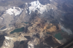(taken by Jed Koball): Peru is considered to be one of the three most vulnerable countries in the world to climate change, in part because of the snow caps in the Andes that are rapidly melting. The heavy rains and subsequent flooding and mudslides in recent weeks are another impact of climate change putting lives at risk. This problem is further exacerbated by the lack of zoning laws, which not only allow families to build homes in at-risk zones but also allow for mining activity near headwaters (as seen in the photo) and other sources of water. Should flooding occur in such areas, the entrance of arsenic, mercury and other contaminants from mining activity into the potable water sources would overwhelm the nation as treatment plants are not capable of handling such high levels of toxins.