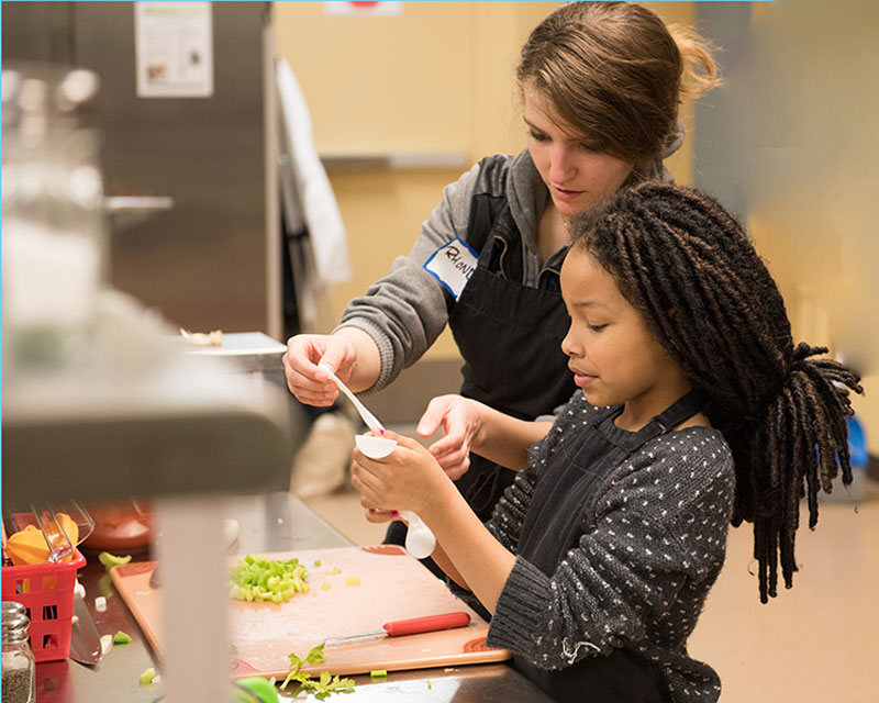 A kitchen ministry was established by Millwood Community Presbyterian Church with the goal of empowering people with the skills to prepare inexpensive and healthy meals. The cooking lessons are free to all in the Spokane community. (Photo by Craig Goodwin)