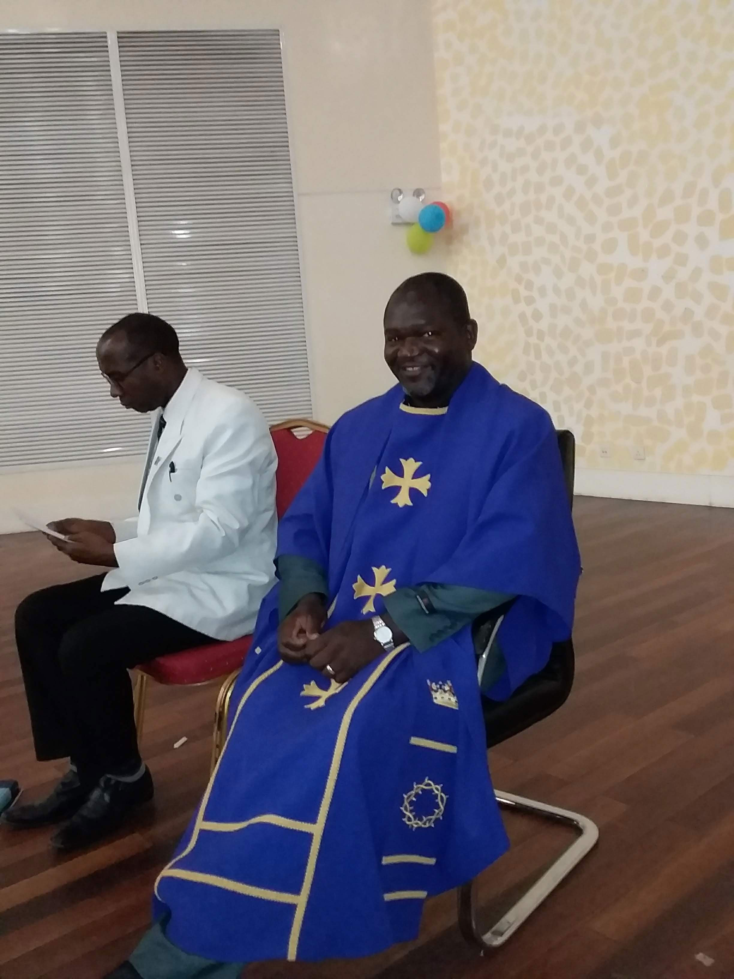 In blue robe, the Reverend Thomson Mkandawire, general secretary of UPCZ. Photo by Rev. Paula Cooper.