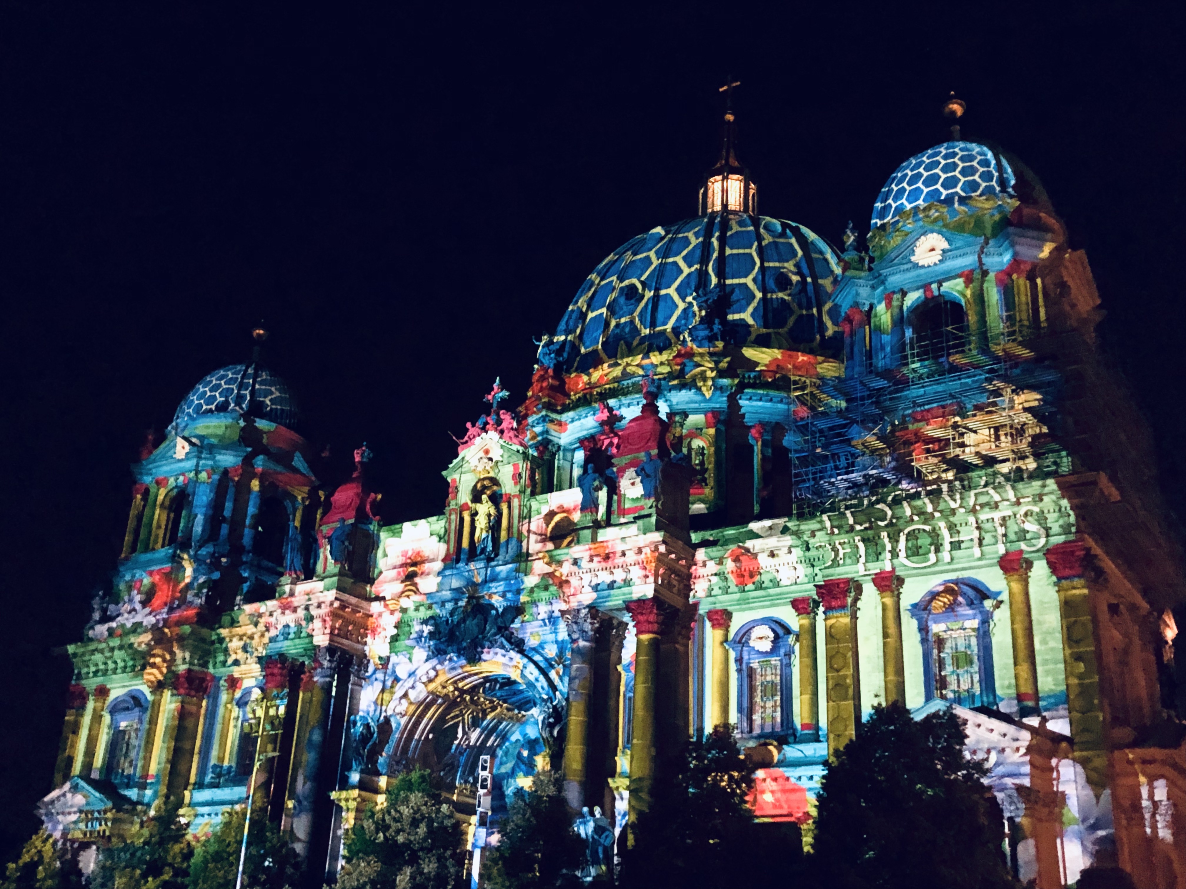The Berliner Dom on Museum Island lit up in color during the annual Berlin Festival of Lights, September 2021. Our family enjoyed a walk through the city in the evening to see the light displays during the festival.