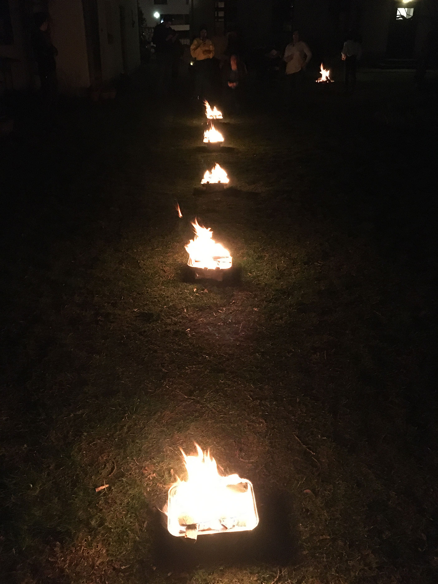 The series of fires set in the church garden on Chaharshanbe Suri. People jump over the fires in symbolism of burning away the bad of the previous year, with hope and light for the upcoming year. (Photo: Ryan White)