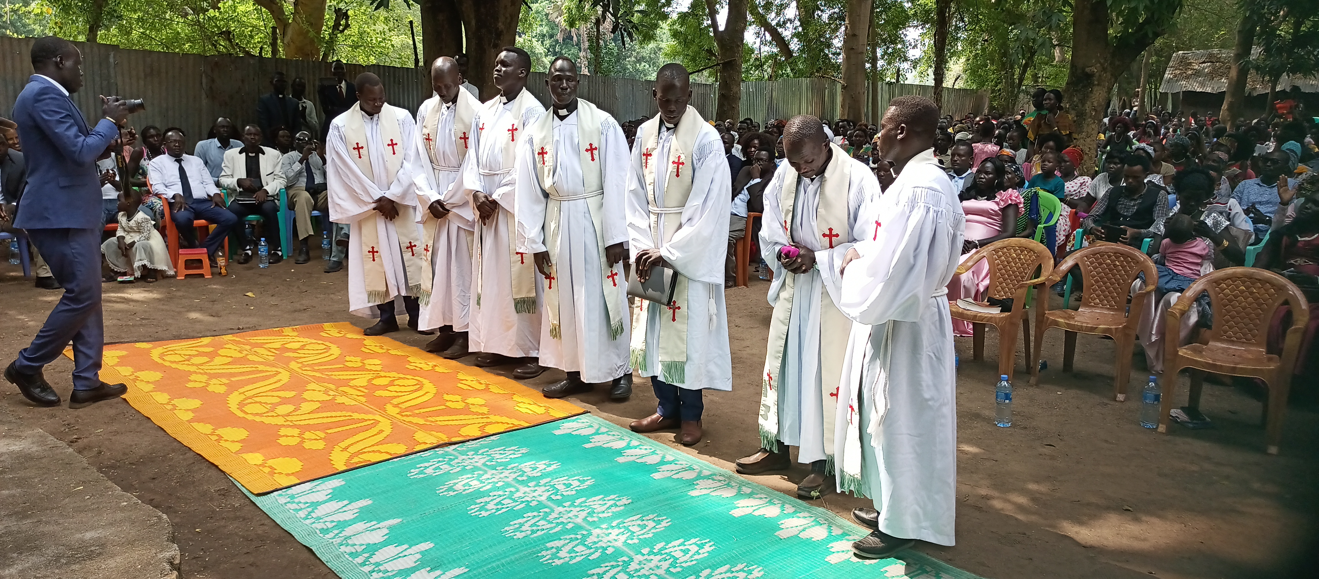 The ordination of (from left to right) Rev. William Cham, Rev. Opiew Ojulu, Rev. Gnigwo Omod, Rev. Mitiku Agwa, Rev. Olora Okweri, Rev. Aserat Gebreyesus,  and Rev. Apay Ojulu. Courtesy of Rev Gnigwo Omod.