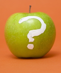 apple with question mark painted on it