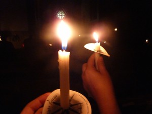 Sharing the light of Christ at a candlelight service