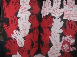 A display of Red Hands with the message that children are children, not soldiers