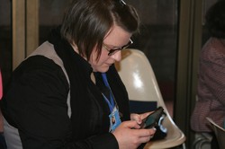Rhonda Everdyke working on her phone
