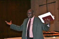 Peter Tibi preaching