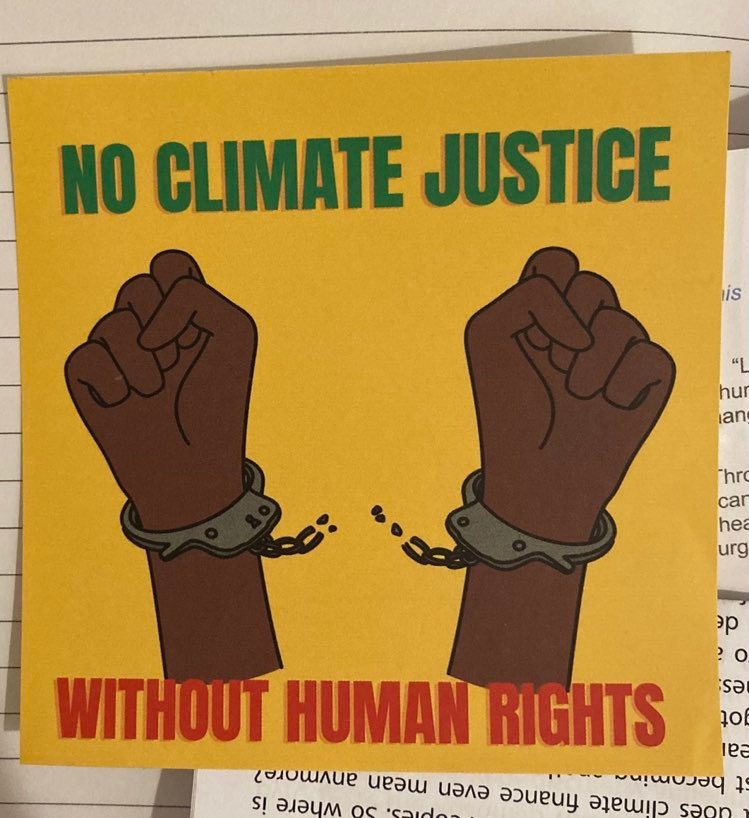 Two hands breaking free with text No climate Justice without Human Rights